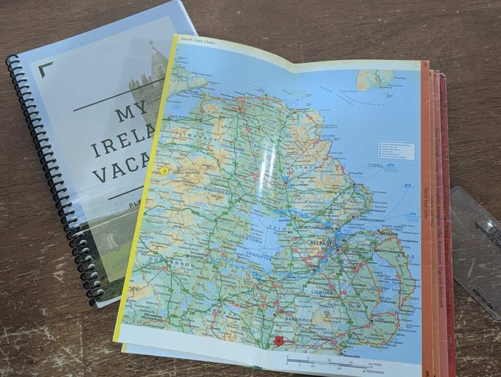 open Ireland map with vacation planner journal
