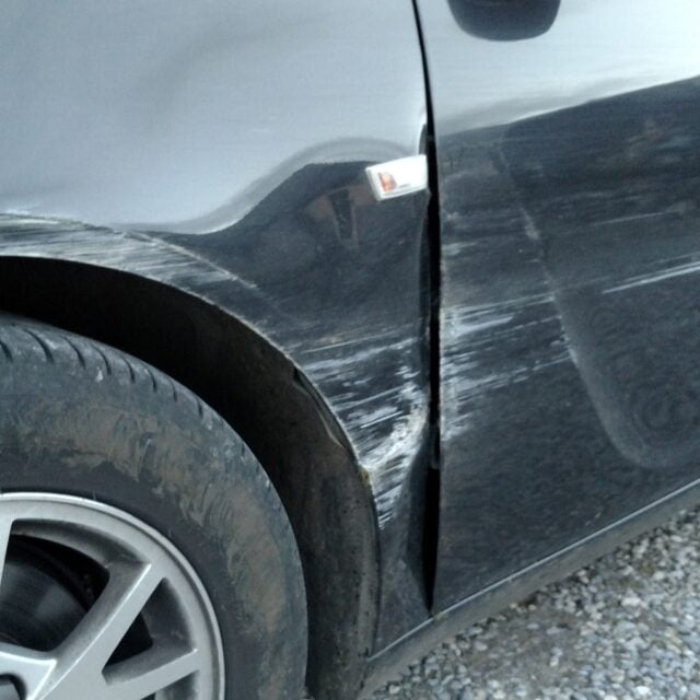 rental car vs stone wall in Ireland