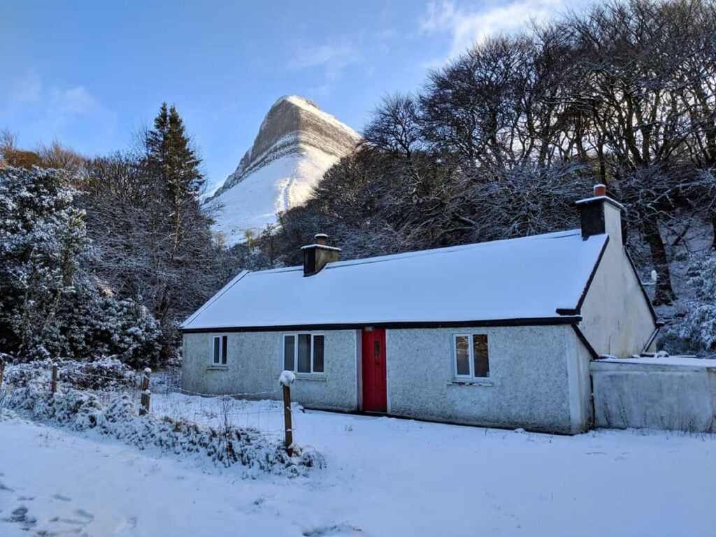 Benbulben and cottage in snow